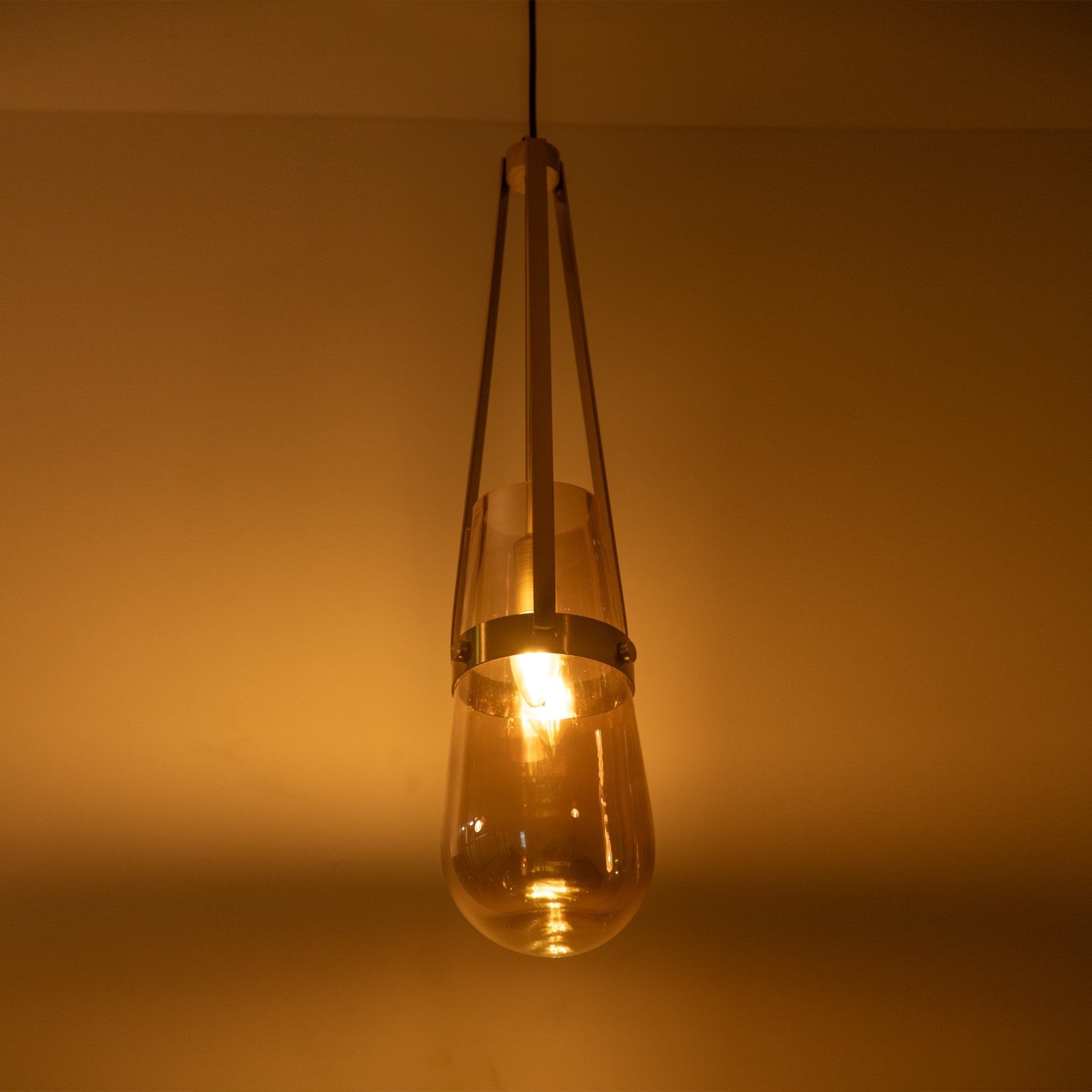 Shop Trikone Amber Pendant Light Corner